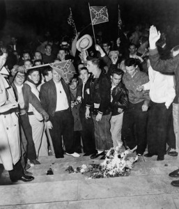 Students at the University of Alabama burning civil rights literature